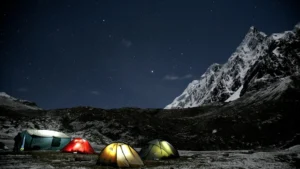 High-altitude camping tents under a starry sky during the Ausangate Trek in Peru