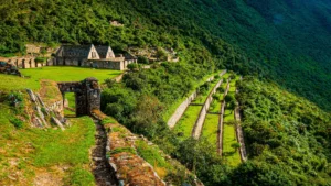 Ancient Inca terraces of Choquequirao illuminated by morning sun during the Choquequirao Trek 5 Days Classic.
