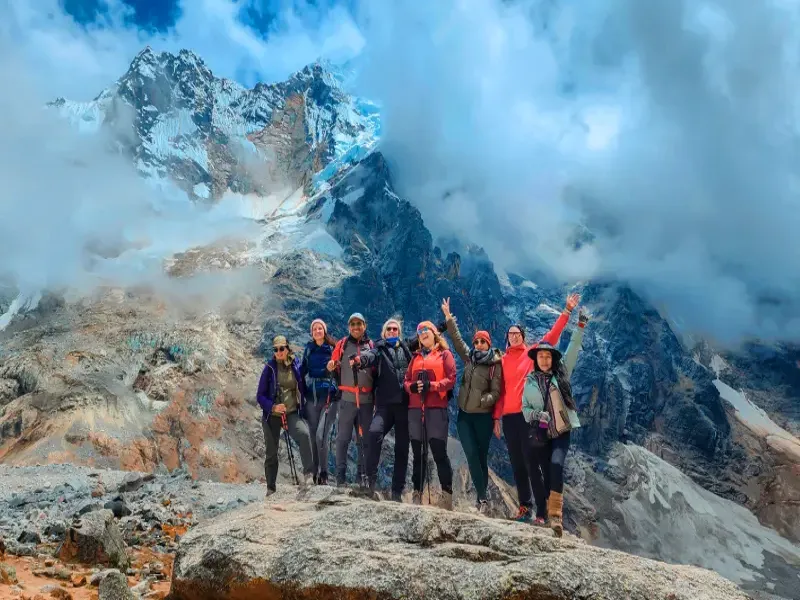Group of trekkers at Humantay Lake and Salkantay Pass during a 2-day trek in the Andes