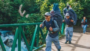 Night camp on the Inca Trail Classic 4 Days with tents and mountains under a starry sky.