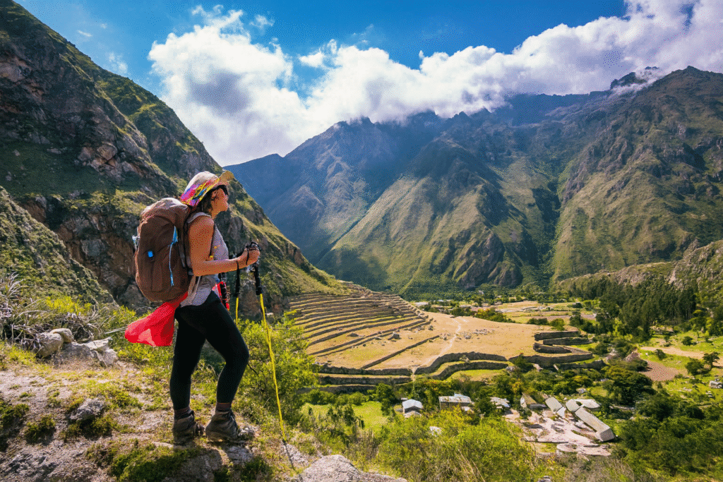 Hikers exploring ancient Inca ruins on the Private Inca Trail with Pacha Perú Explorers