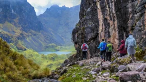 Hikers crossing a high mountain pass on the Lares Trek in the Andes