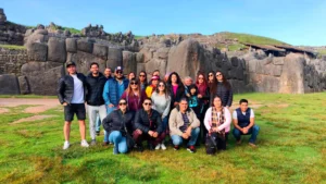 Group of travelers visiting Sacsayhuamán during a Cusco City Tour in Peru.