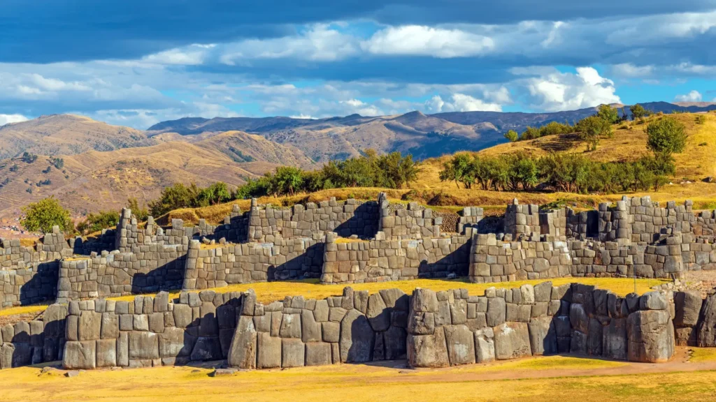 Massive stone walls of Sacsayhuamán Inca fortress overlooking Cusco, Peru.