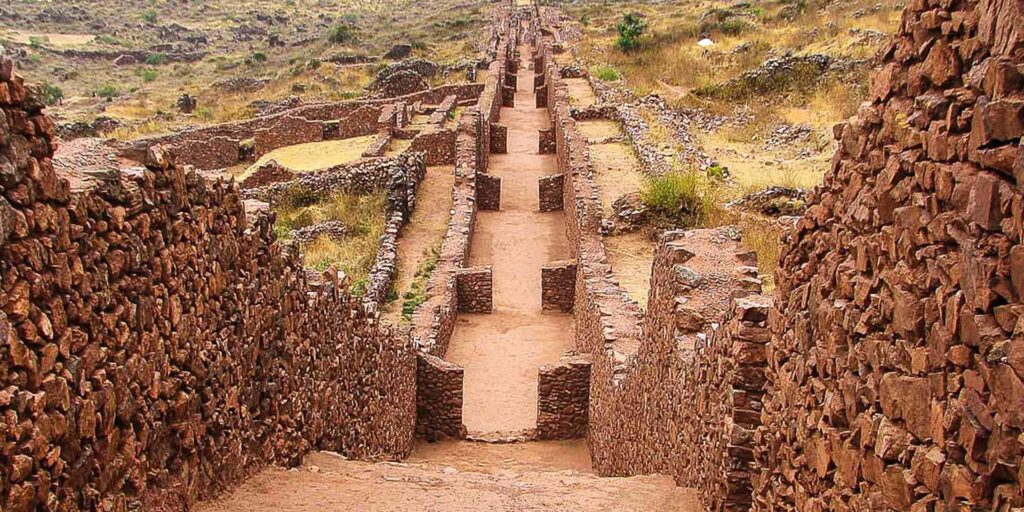Ancient Wari stone corridors at Pikillaqta archaeological site in South Valley Cusco Peru
