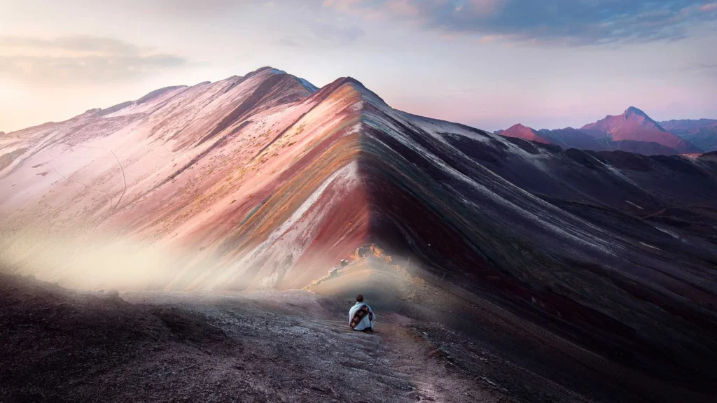 Sunrise view of Rainbow Mountain Vinicunca with colorful Andean ridges