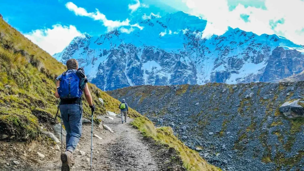 Hikers reaching the Salkantay Pass on the Salkantay Trek to Machu Picchu