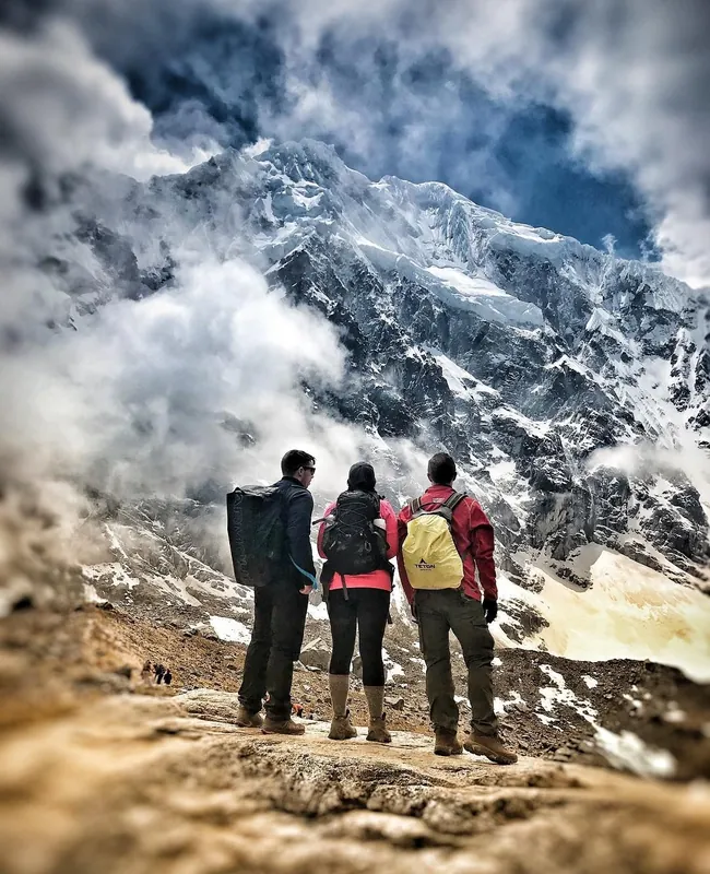 Hikers on the Salkantay Treks to Machu Picchu with glacier mountain views