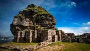 Andean mountain landscape surrounding Waqrapukara during a day trek from Cusco.